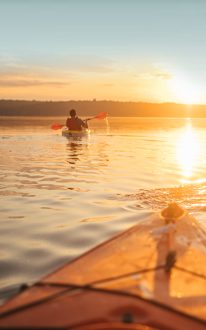 kayaks-sunset kayaks at sunset on Kerr Lake