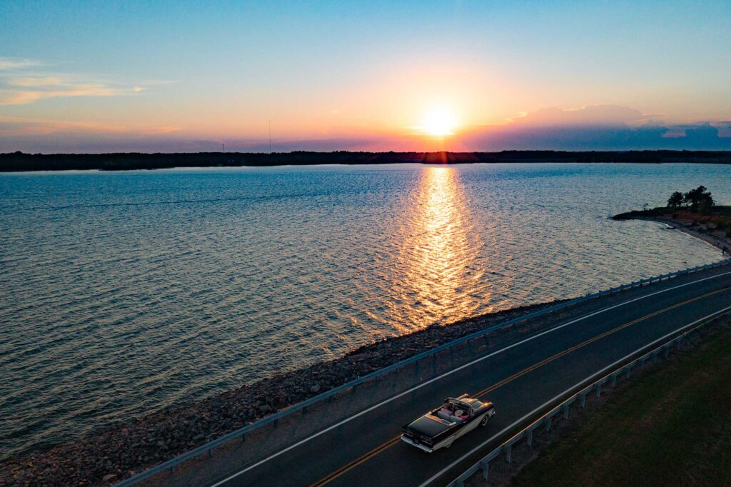 scenic-drive-by-lake-sunset